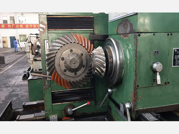 Bevel gear mating machine